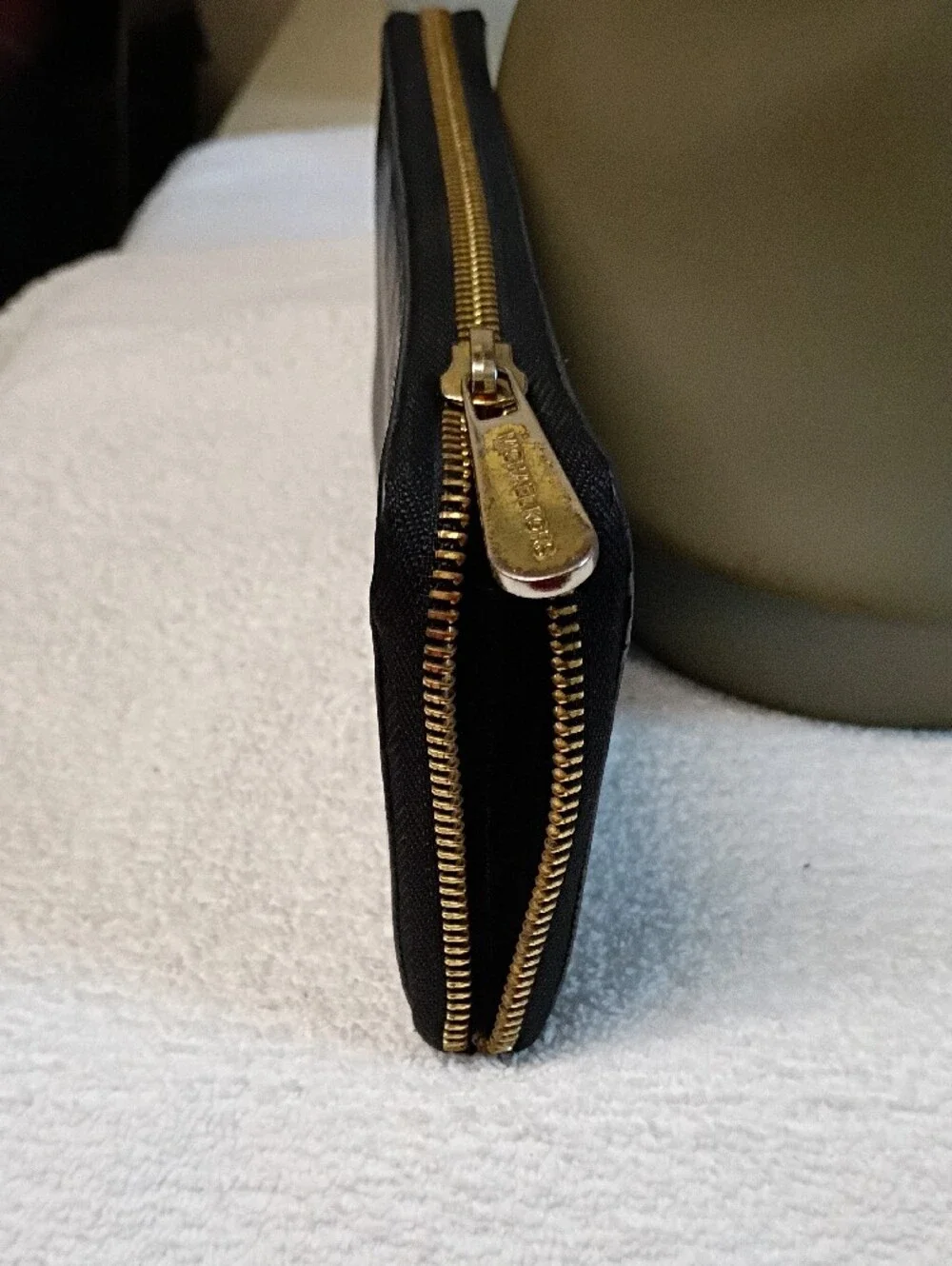 Michael Kors Black Zip-Around Saffiano Wallet with Gold Logo